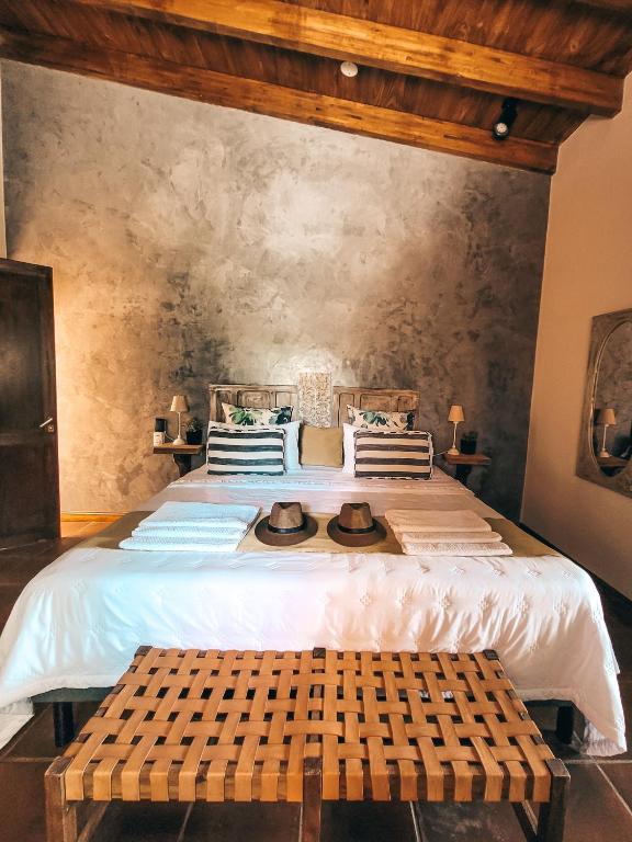 Postel nebo postele na pokoji v ubytování Finca La Saucina Casa de Campo