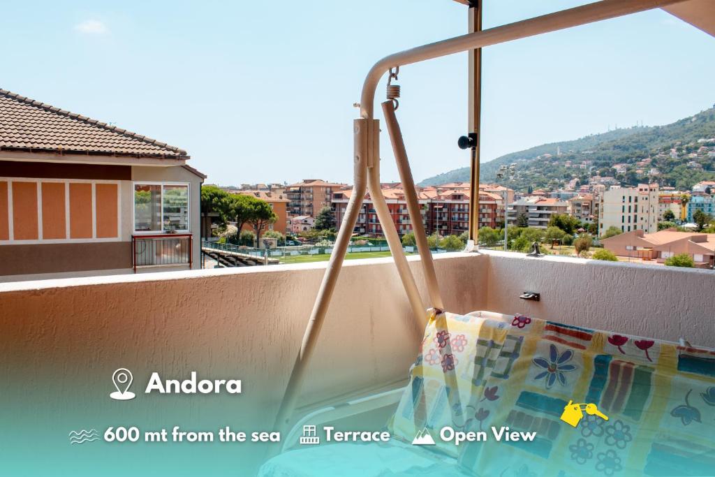 a hot tub on a balcony with a view of a city at [600 metri dal mare] Relax con fresco terrazzo in Marina di Andora