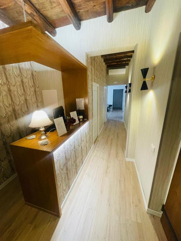 Postel nebo postele na pokoji v ubytování ROME'S GLORIA HOTEL