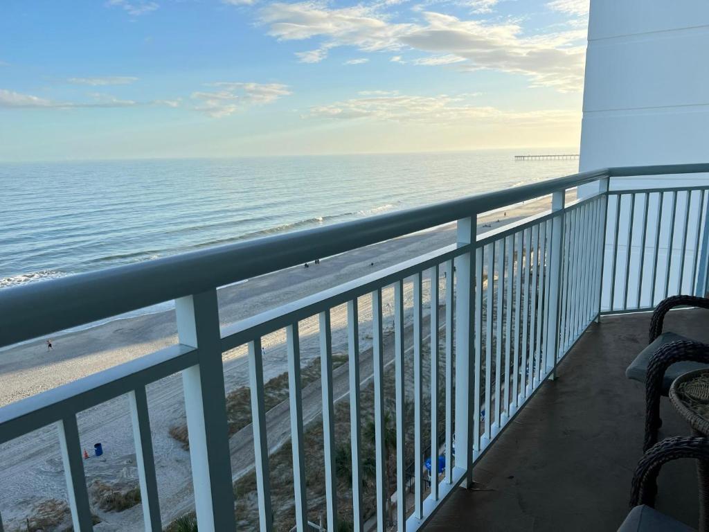 a balcony with a view of the beach at 2501 S Ocean Blvd, 0811 - Ocean Front Sleeps 8 in Myrtle Beach