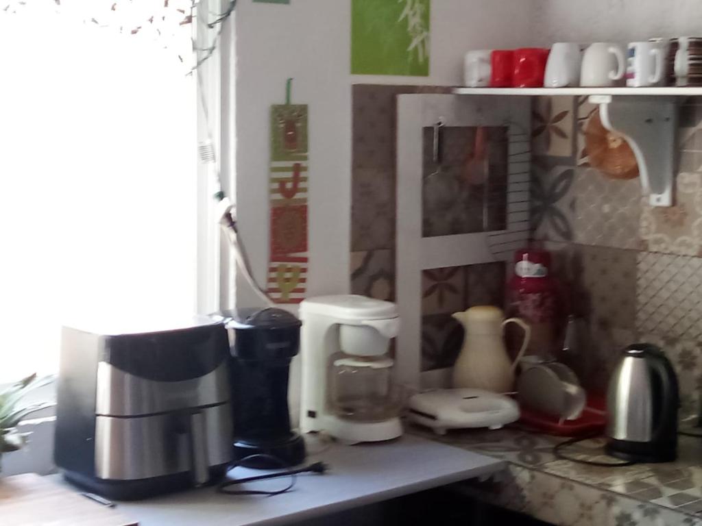Kuchyň nebo kuchyňský kout v ubytování Naranjo Hostel