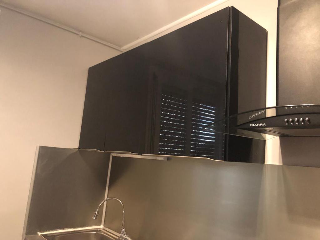 Kuchyň nebo kuchyňský kout v ubytování Beauvais chambre 1