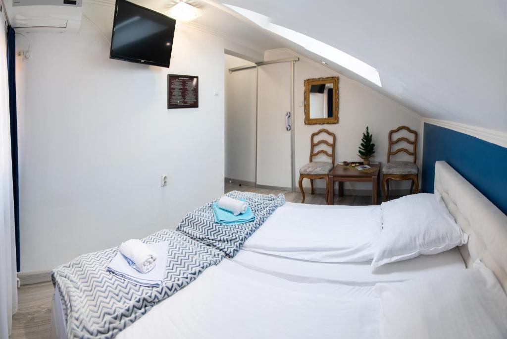 Voodi või voodid majutusasutuse Guest House Ćiro toas