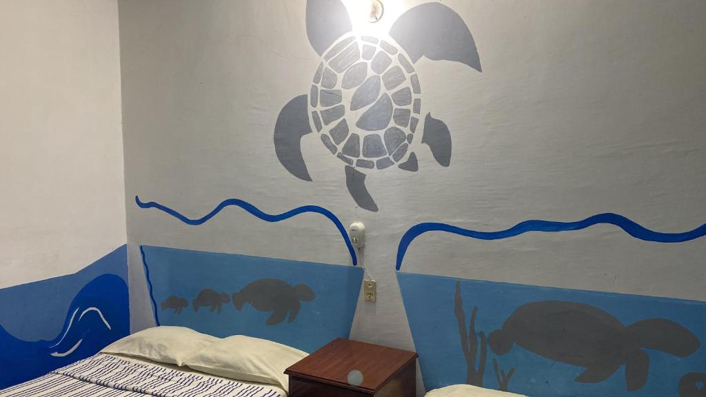 Postel nebo postele na pokoji v ubytování Hotel Lu'um
