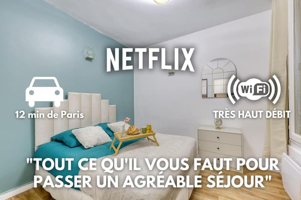een kamer met een slaapkamer met een bed en een tafel bij Guest Loc - 10min Paris - Oasis de Paix - Netflix in Villejuif