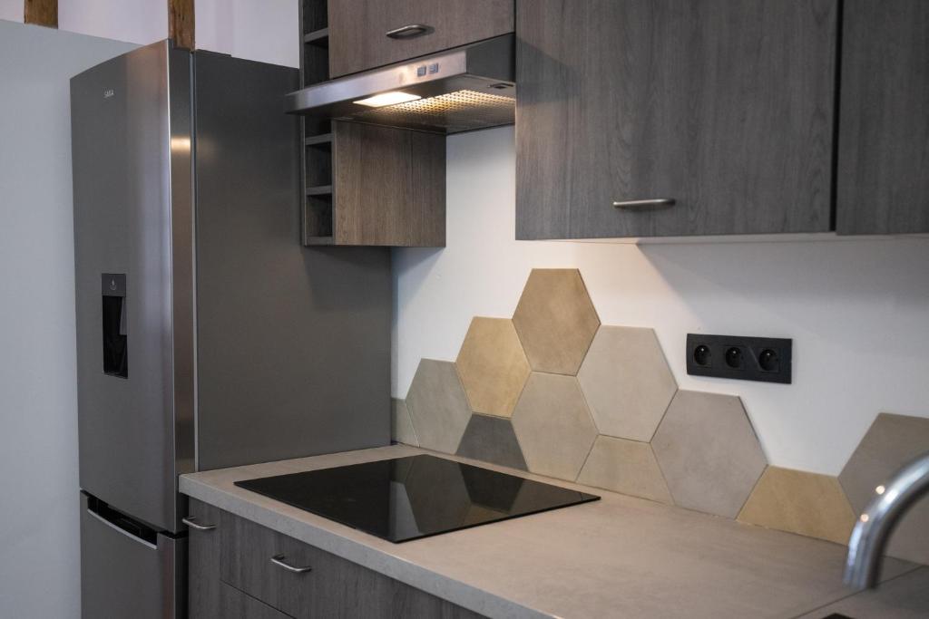 Kuchyň nebo kuchyňský kout v ubytování Le Duplex - Hypercentre - Wifi