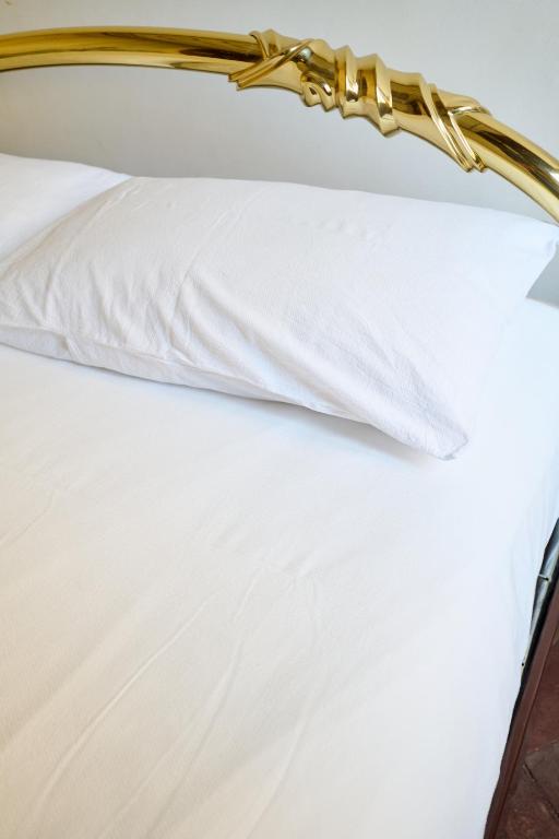 Posteľ alebo postele v izbe v ubytovaní Casa Marianna - Città Alta - Appartamento Affrescato - Bergamo