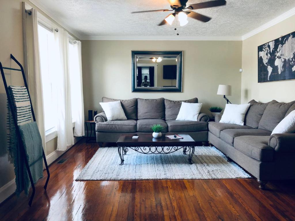 a living room with a couch and a coffee table at Cozy 2 bedroom 1 bath unit in Anderson