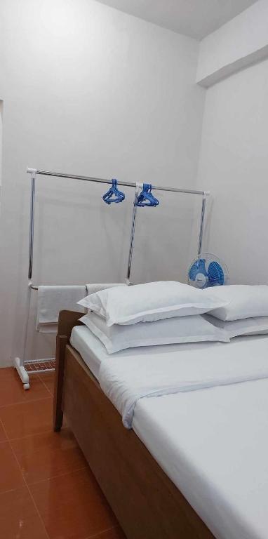 Postel nebo postele na pokoji v ubytování Villa Juan y Exequila