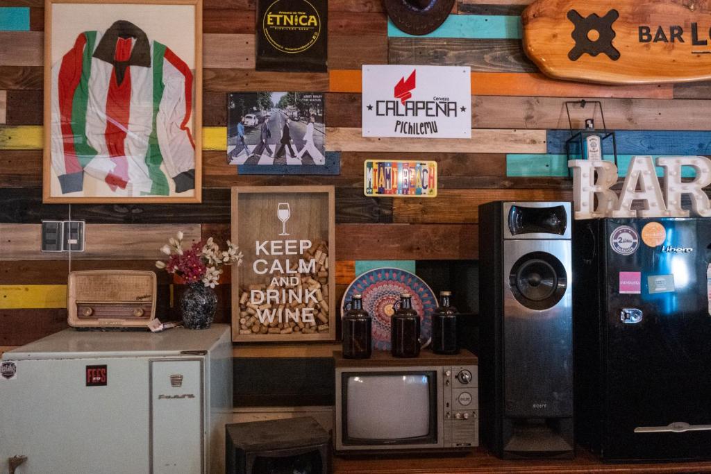 A kitchen or kitchenette at LÖF Hostal
