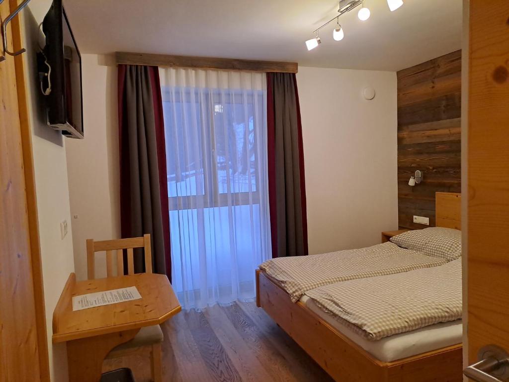 Posteľ alebo postele v izbe v ubytovaní Zimmer & Appartements Schwarzenbacher Sonja & Konrad