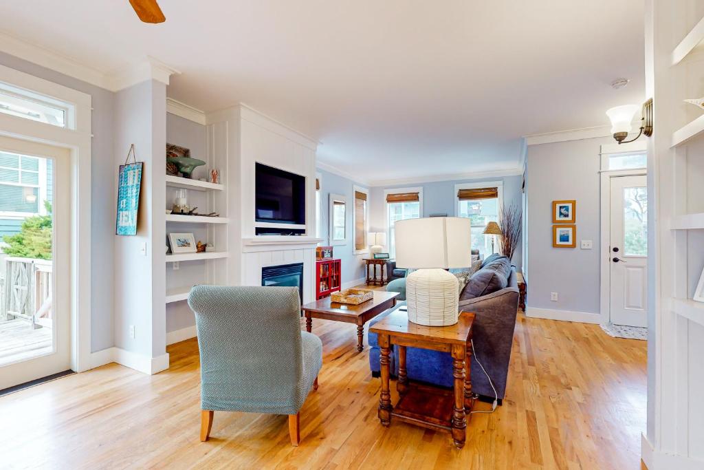 a living room with a couch and a table at Jewel Box at the Beach in Lincoln City