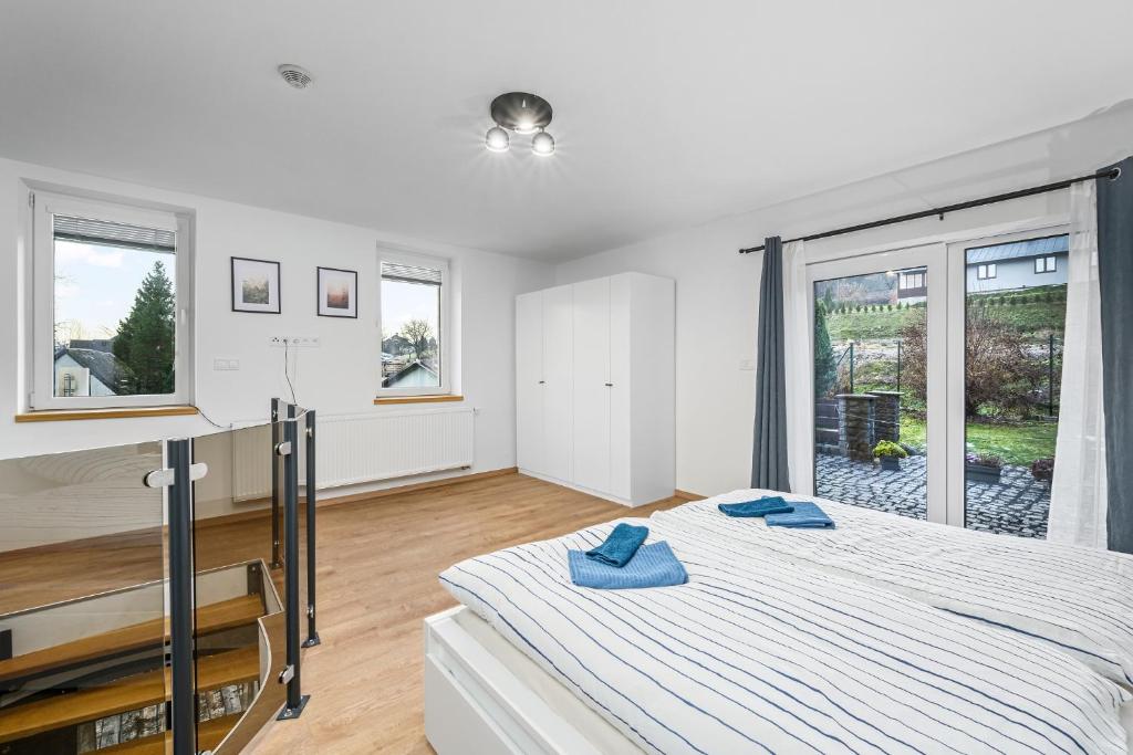 Postel nebo postele na pokoji v ubytování Apartmán Hamrovka