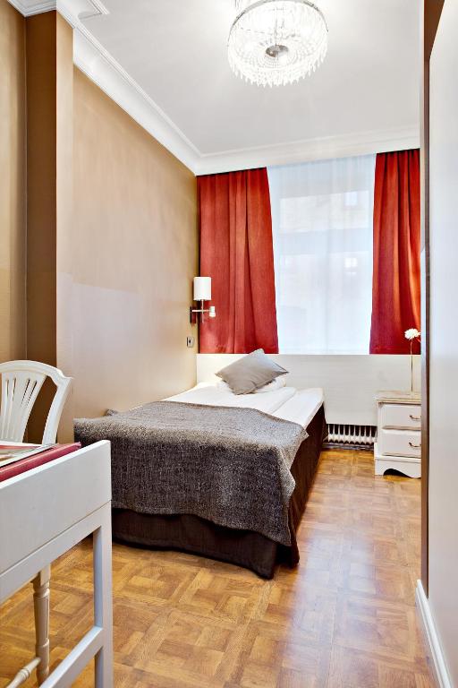 Postel nebo postele na pokoji v ubytování Hotel Vasa, BW Signature Collection