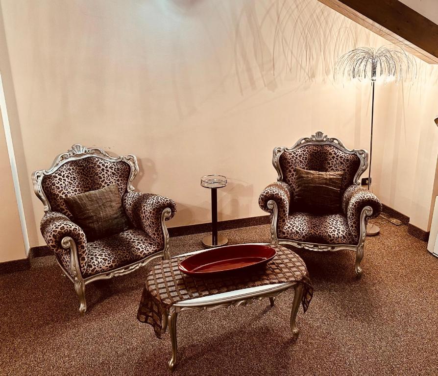 Posezení v ubytování Hotel Malpensa INN Aereoporto