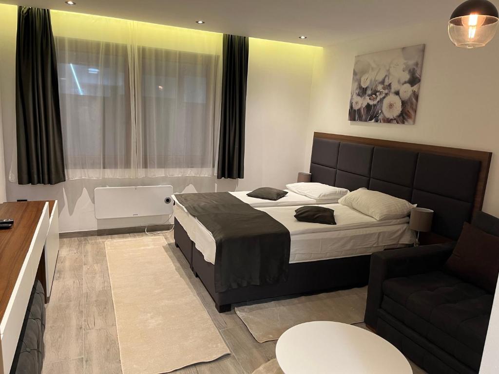 Voodi või voodid majutusasutuse Apart Hotel & spa Zoned II, Kopaonik, apartman Lukač - special benifit Children up to 13 of age accompanied by two adutls staj for free! FREE PARKING! toas