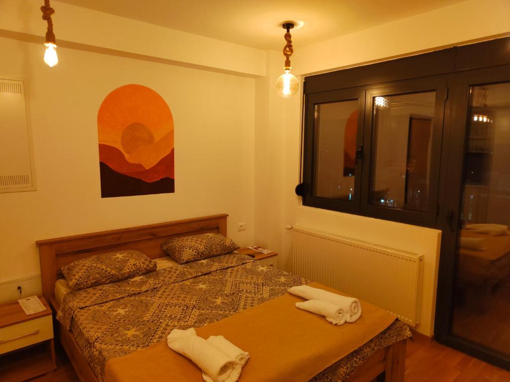 Postel nebo postele na pokoji v ubytování Boho style