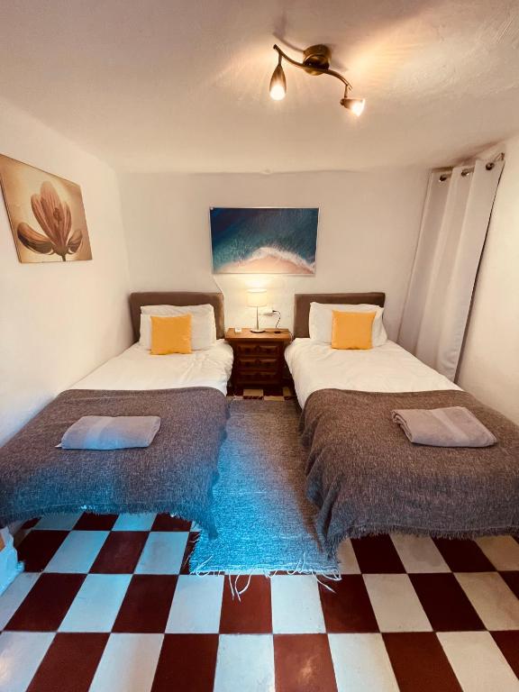 Postel nebo postele na pokoji v ubytování Casa Mandarina