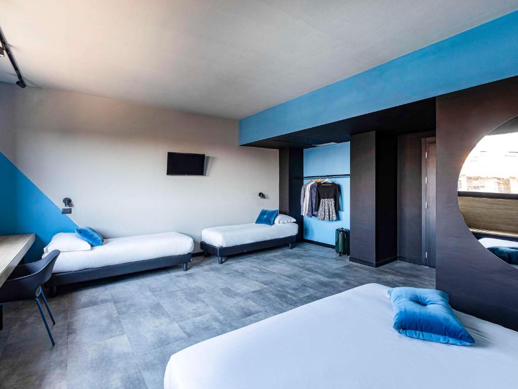 Postel nebo postele na pokoji v ubytování Ibis Styles Roma Aurelia