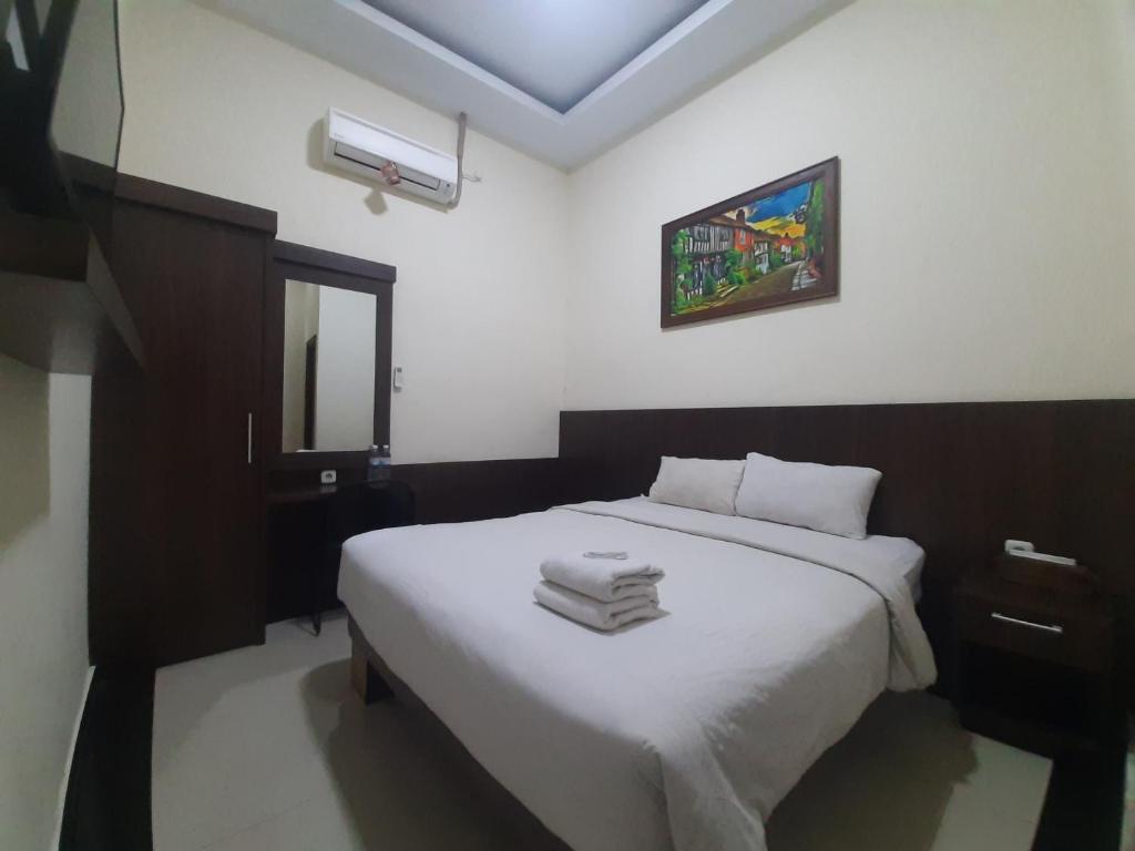 Urbanview Alfiya Hotel Lampung by RedDoorz - Quarto Duplo Superior
