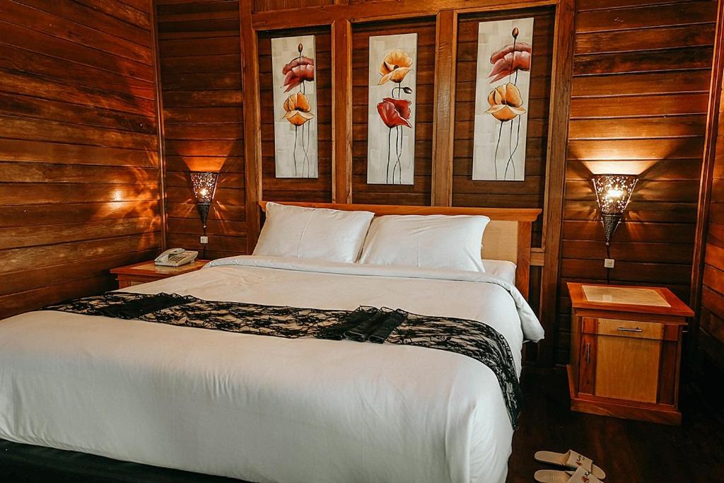 Postel nebo postele na pokoji v ubytování Kastuba Resort