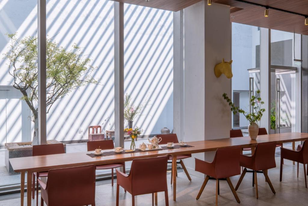 Ristorante o altro punto ristoro di Wuyu Hotel Chongqing Zoo & Yangjiaping The Mixc Light rail