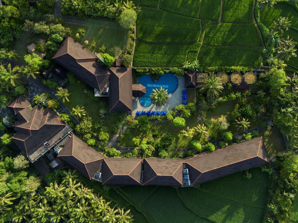 an overhead view of a house with a yard at Bhuwana Ubud Hotel and Farming in Ubud