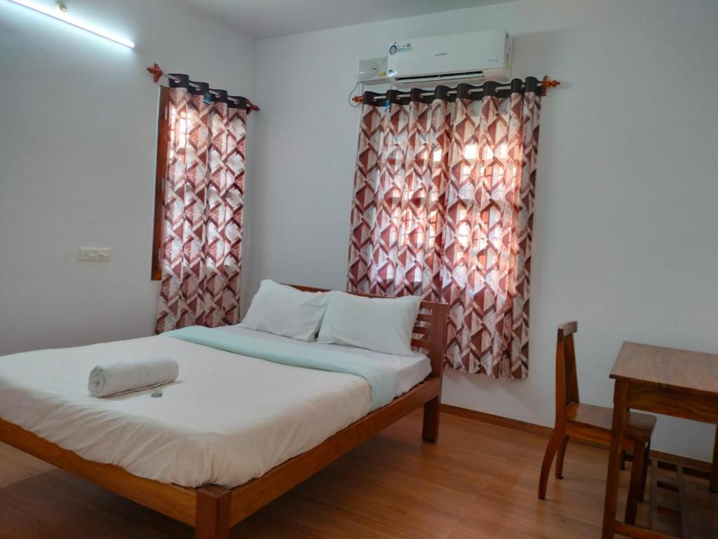 Postel nebo postele na pokoji v ubytování Paradise Le Bonheur Guest House