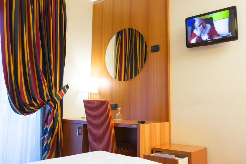 TV a/nebo společenská místnost v ubytování Hotel Touring