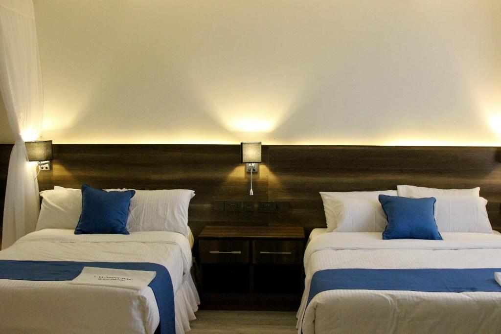 Postel nebo postele na pokoji v ubytování Lukenya Alkebu Resort