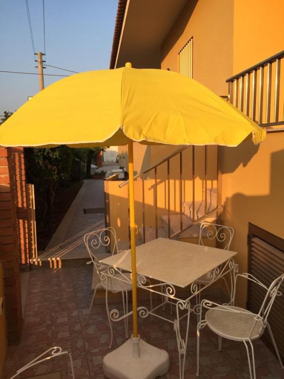 Patio nebo venkovní prostory v ubytování B&B Fiori Gialli Caucana