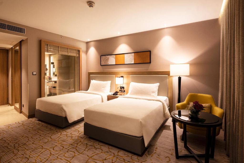 Postel nebo postele na pokoji v ubytování LYFE HOTEL