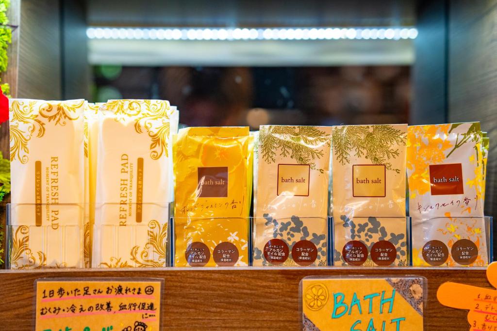 a bunch of boxes of birth food on a counter at Hotel Actel Nagoya Nishiki in Nagoya