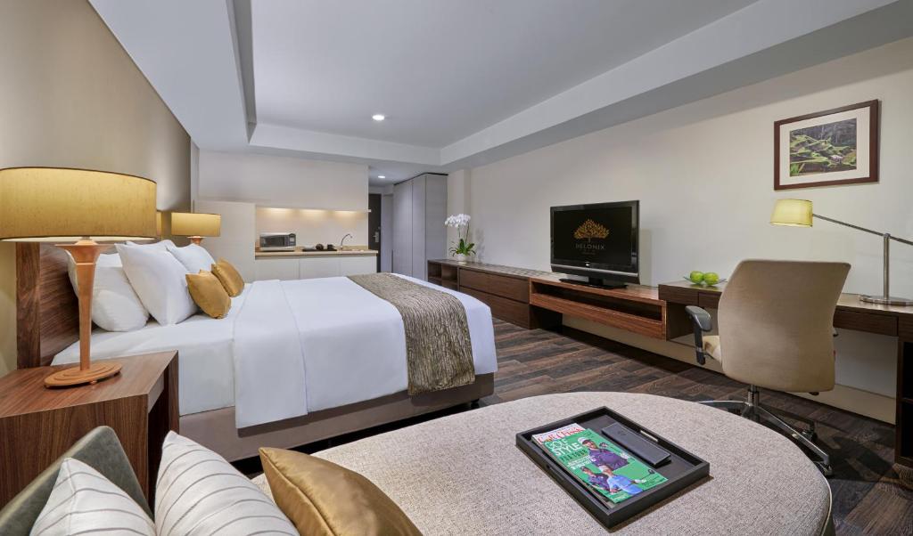 TV a/nebo společenská místnost v ubytování Delonix Hotel Karawang