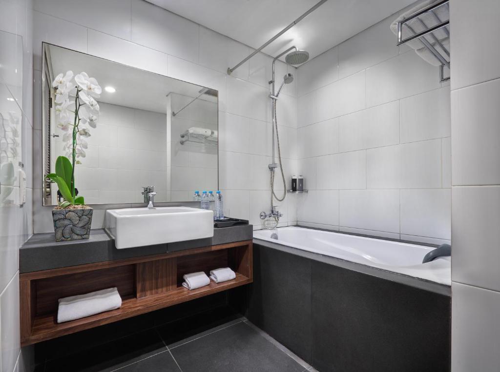 Koupelna v ubytování Delonix Hotel Karawang