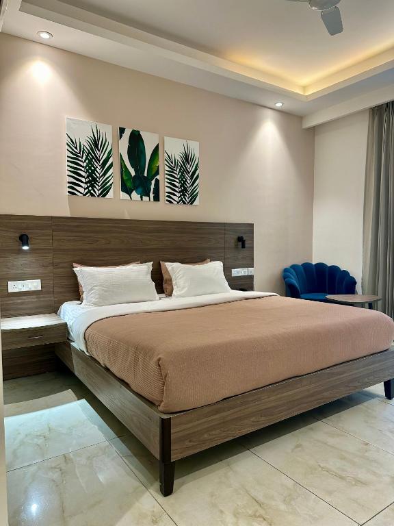 Postel nebo postele na pokoji v ubytování Flock Hotel I Golf Course Road Near Dlf Phase 1 Metro station I Gurugram