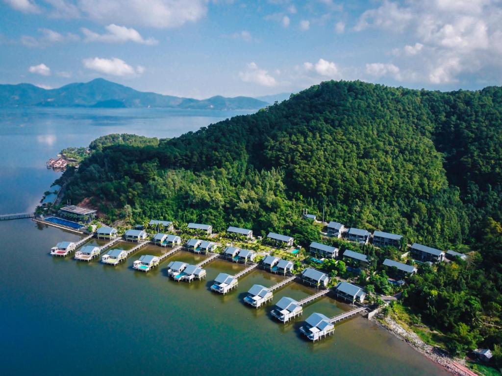 an aerial view of a harbor with cars parked at Vedana Lagoon Resort & Spa in Hue