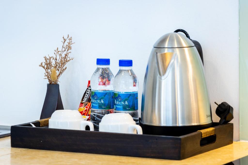 Příslušenství pro přípravu čaje a kávy v ubytování CDX RESIDENCE