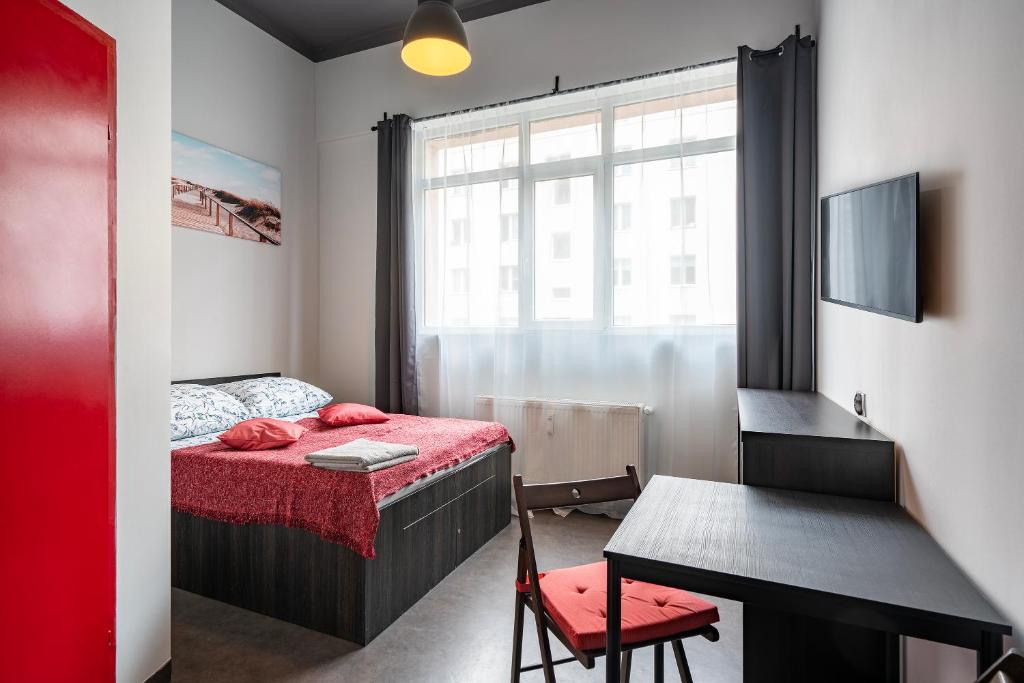 Postel nebo postele na pokoji v ubytování 110 Hostel