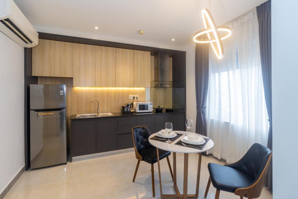 Kuchyň nebo kuchyňský kout v ubytování CDX RESIDENCE