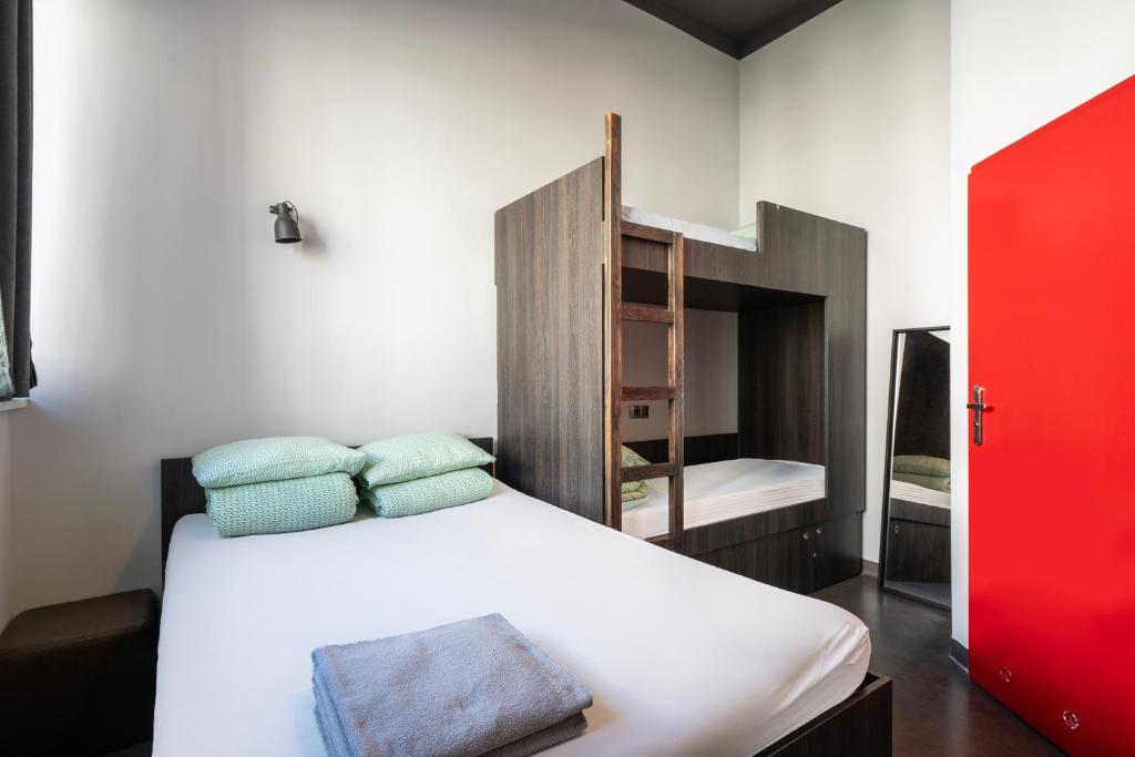 Postel nebo postele na pokoji v ubytování 110 Hostel