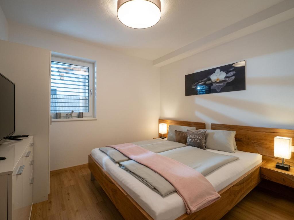 Postel nebo postele na pokoji v ubytování Ferienwohnung Klocker