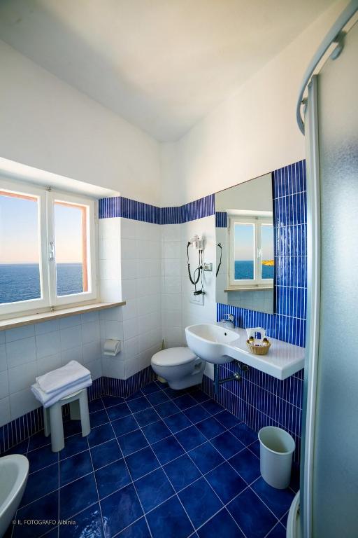 Koupelna v ubytování Hotel Saraceno