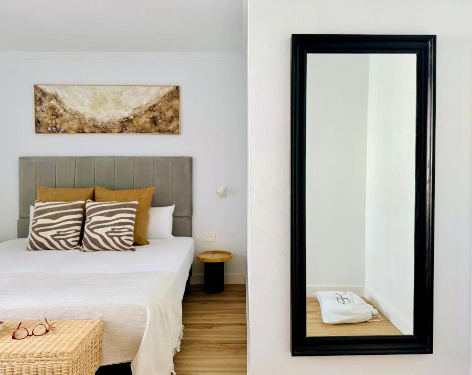 Postel nebo postele na pokoji v ubytování Canaryislandshost l Amapola