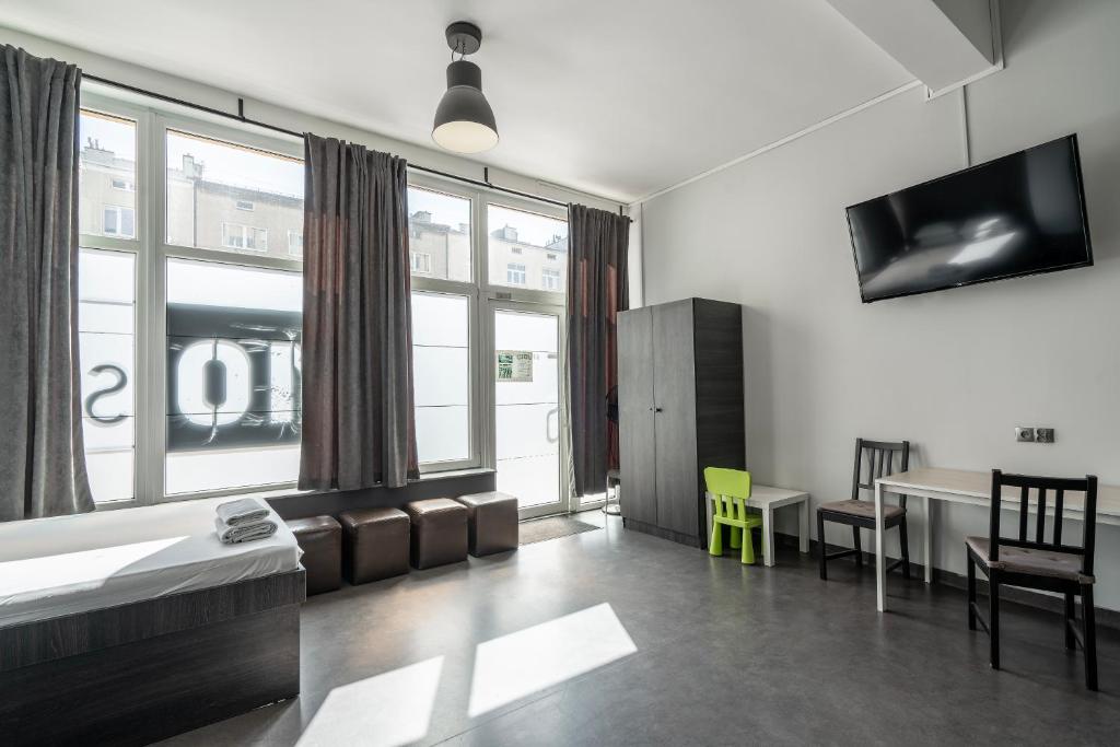 TV a/nebo společenská místnost v ubytování 110 Hostel