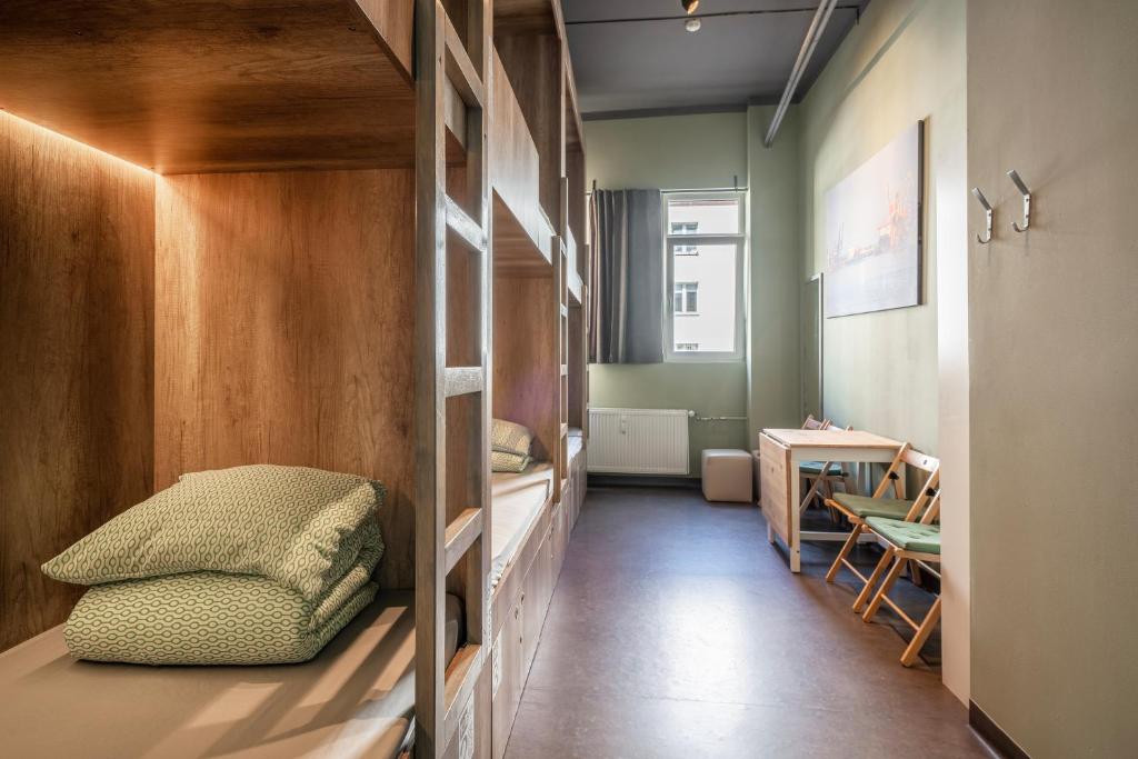 Postel nebo postele na pokoji v ubytování 110 Hostel