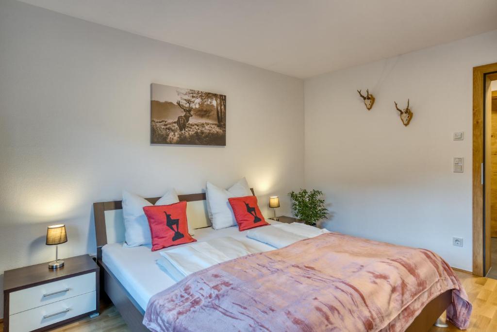 מיטה או מיטות בחדר ב-Apartment Tristkogel