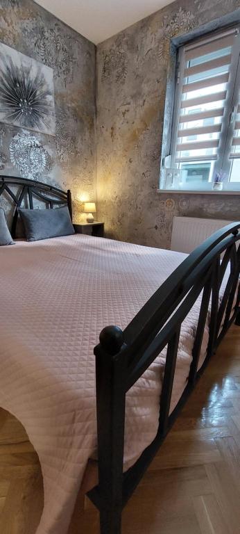 Postel nebo postele na pokoji v ubytování Apartman Lora