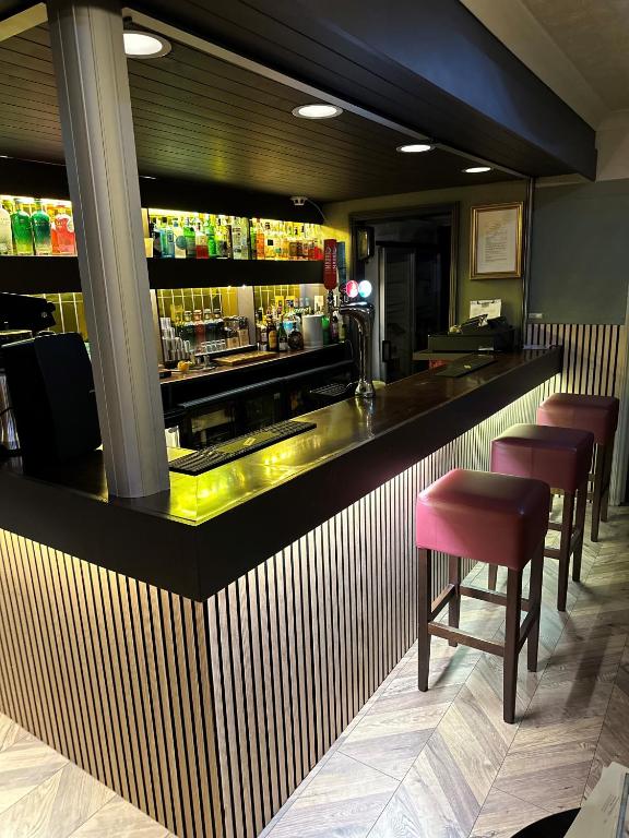 Lounge nebo bar v ubytování The Q Hotel