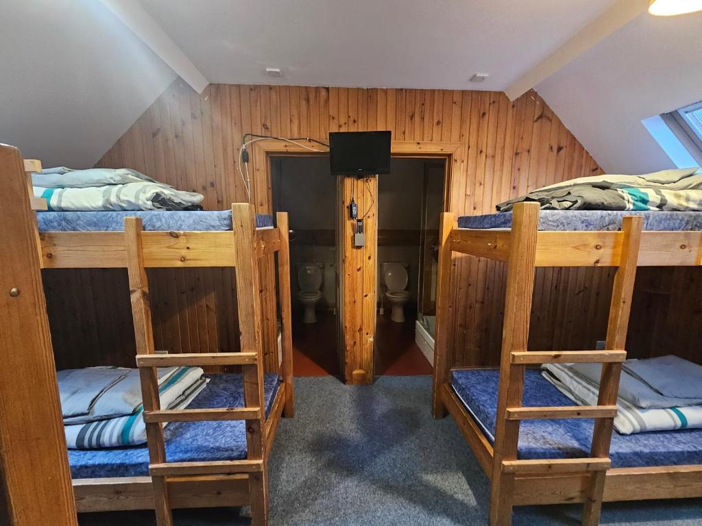 Postel nebo postele na pokoji v ubytování Blackwater Hostel